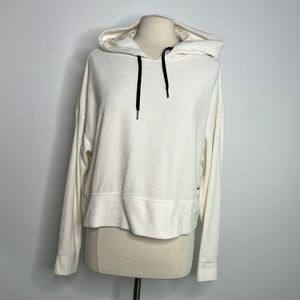 Calvin Klein cream / off white crushed velvet cropped hoodie, size Large